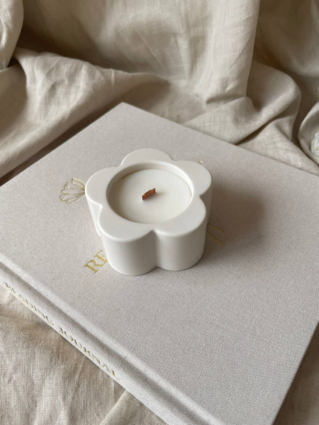 ‘Peonies & Peaches’ soy‑wax scented candle.