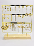 A hanging pair of refined, trendy, chic steel earrings