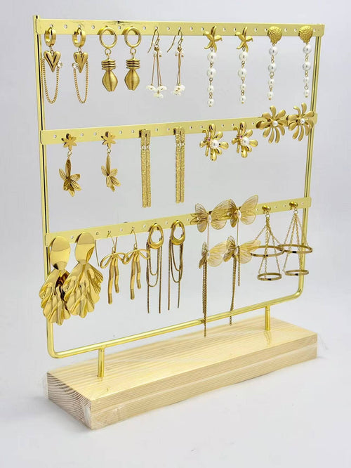 A hanging pair of refined, trendy, chic steel earrings
