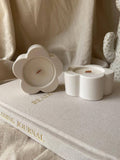 ‘Peonies & Peaches’ soy‑wax scented candle.
