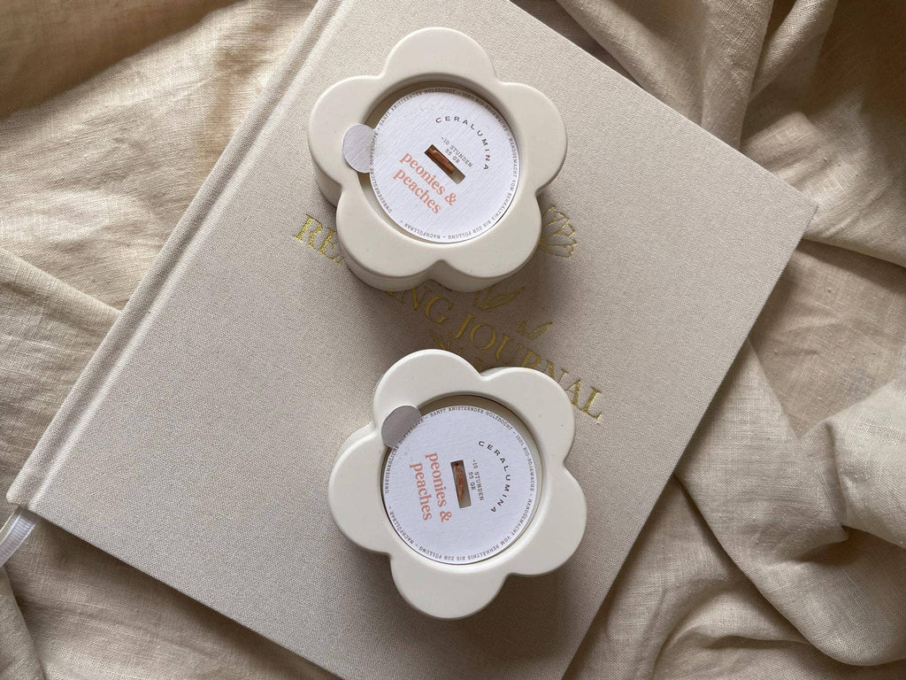 ‘Peonies & Peaches’ soy‑wax scented candle.