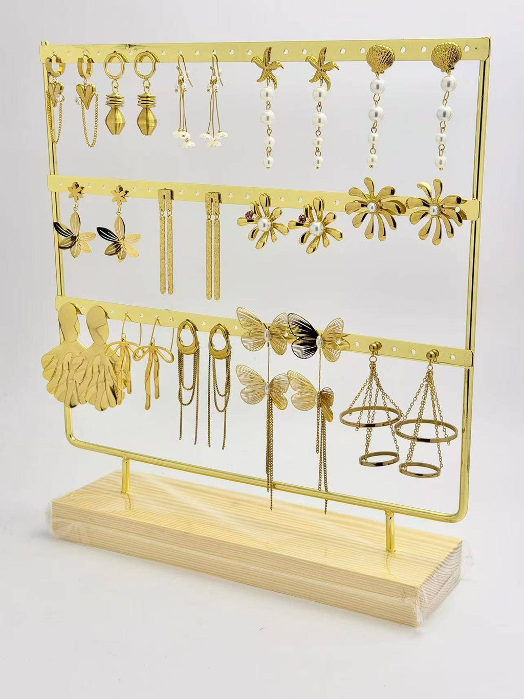 A hanging pair of refined, trendy, chic steel earrings